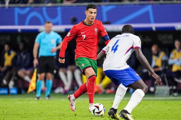 2024-07-05 Portugal v France - Quarter-Final - UEFA EURO, EM, Europameisterschaft,Fussball 2024 HAMBURG, GERMANY - JULY 5: Cristiano Ronaldo of Portugal dribbles during the Quarter-Final - UEFA EURO 2024 match between Portugal and France at Volksparkstadion on July 5, 2024 in Hamburg, Germany. (Photo by Joris Verwijst BSR Agency) Hamburg Germany Content not available for redistribution in The Netherlands directly or indirectly through any third parties. Copyright: xBSRxAgencyx