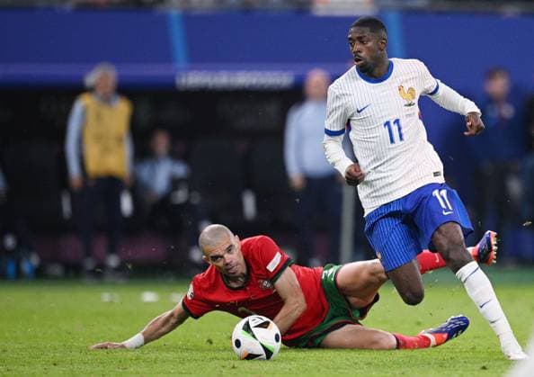 Russia Soccer Euro 2024 Portugal - France 8723241 05.07.2024 Portugal s Pepe and France s Ousmane Dembele struggle for the ball during the UEFA EURO, EM, Europameisterschaft,Fussball 2024 quarter final soccer match between Portugal and France at the Volksparkstadion in Hamburg, Germany. Alexey Filippov Sputnik Hamburg Germany  Copyright: xAlexeyxFilippovx
