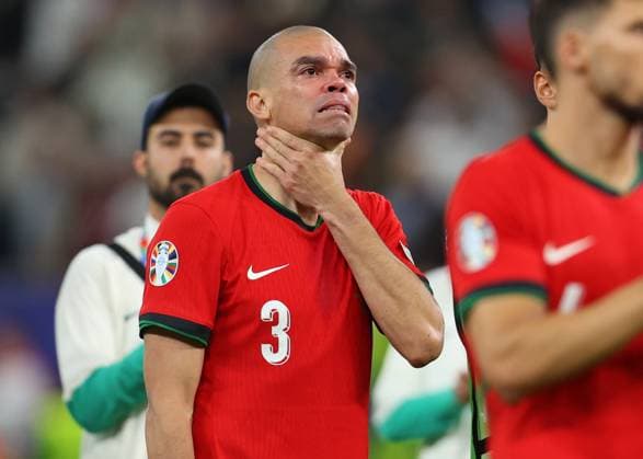 Hamburg, Germany, 5th July 2024. Pepe of Portugal in tears as he thanks the fans during the UEFA European Championships Quarter Final match at Volksparkstadion, Hamburg. Picture credit should read: Paul Terry Sportimage EDITORIAL USE ONLY. No use with unauthorised audio, video, data, fixture lists, club league logos or live services. Online in-match use limited to 120 images, no video emulation. No use in betting, games or single club league player publications. SPI-3217-0066