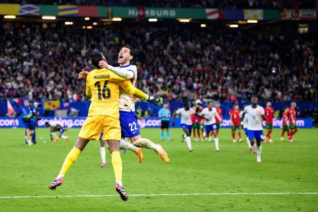 240705 Mike Maignan and Theo Hernandez of France celebrate after the UEFA EURO, EM, Europameisterschaft,Fussball 2024 Football Championship Quarterfinal between Portugal and France on July 5, 2024 in Hamburg. Photo: Jesper Zerman BILDBYRAN kod JZ JZ0551 fotboll football soccer fotball fotbolls-em europamästerskap em uefa euro uefa european football championship euro 2024 portugal frankrike france bbeng bbauto jubel Copyright: JESPERxZERMAN BB240705JZ117