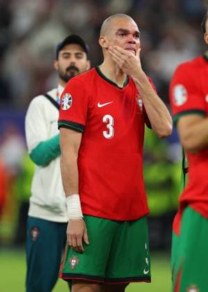Hamburg, Germany, 5th July 2024. Pepe of Portugal in tears as he thanks the fans during the UEFA European Championships Quarter Final match at Volksparkstadion, Hamburg. Picture credit should read: Paul Terry Sportimage EDITORIAL USE ONLY. No use with unauthorised audio, video, data, fixture lists, club league logos or live services. Online in-match use limited to 120 images, no video emulation. No use in betting, games or single club league player publications. SPI-3217-0067