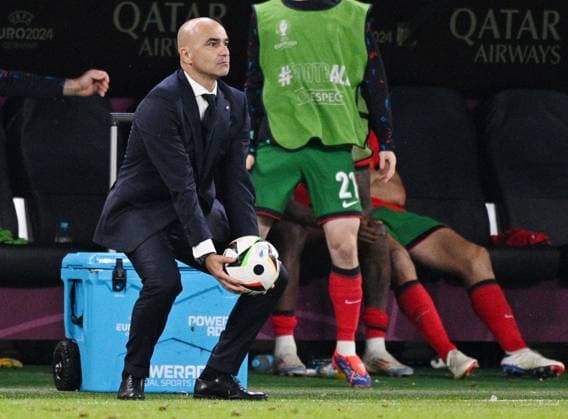 Russia Soccer Euro 2024 Portugal - France 8723251 05.07.2024 Portugal s head coach Roberto Martinez holds the ball during the UEFA EURO, EM, Europameisterschaft,Fussball 2024 quarter final soccer match between Portugal and France at the Volksparkstadion in Hamburg, Germany. Alexey Filippov Sputnik Hamburg Germany  Copyright: xAlexeyxFilippovx