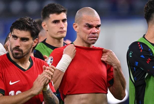 Russia Soccer Euro 2024 Portugal - France 8723277 05.07.2024 Portugal s Ruben Neves and Pepe react following the team s defeat in the penalty shoot-out during the UEFA EURO, EM, Europameisterschaft,Fussball 2024 quarter final soccer match between Portugal and France at the Volksparkstadion in Hamburg, Germany. Alexey Filippov Sputnik Hamburg Germany  Copyright: xAlexeyxFilippovx