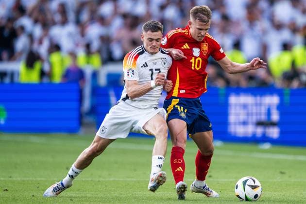 240705 Florian Wirtz of Germany and Daniel Olmo of Spain during the UEFA EURO, EM, Europameisterschaft,Fussball 2024 Football Championship quarterfinal between Spain and Germany on July 5, 2024 in Stuttgart. Photo: Mathias Bergeld BILDBYRAN kod MB MB0942 fotboll football soccer fotball fotbolls-em europamästerskap em uefa euro uefa european football championship euro 2024 kvartsfinal quarterfinal quarterfinals spanien spain tyskland germany bbeng Copyright: MATHIASxBERGELD BB240705MB186