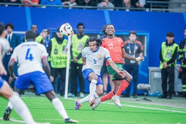 EURO 2024 - Quarter-Finals: Portugal vs. France Jules Kounde and Rafael Leao in action during the EURO 2024 Quarter-Final match between Portugal and France on 05 July 2024, at Volksparkstadion, in Hamburg, Germany Hamburg Volksparkstadion Germany Copyright: xAlexandraxFechetex DSC04792