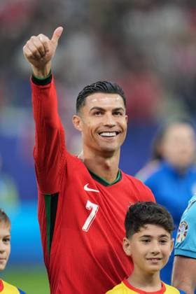(240706) -- HAMBURG, July 6, 2024 -- Cristiano Ronaldo of Portugal reacts before the UEFA EURO, EM, Europameisterschaft,Fussball 2024 quarter-final match between Portugal and France in Hamburg, Germany on July 5, 2024. ) (SP)GERMANY-HAMBURG-FOOTBALL-EURO 2024-QUARTER FINAL-PORTUGAL VS FRANCE PengxZiyang 