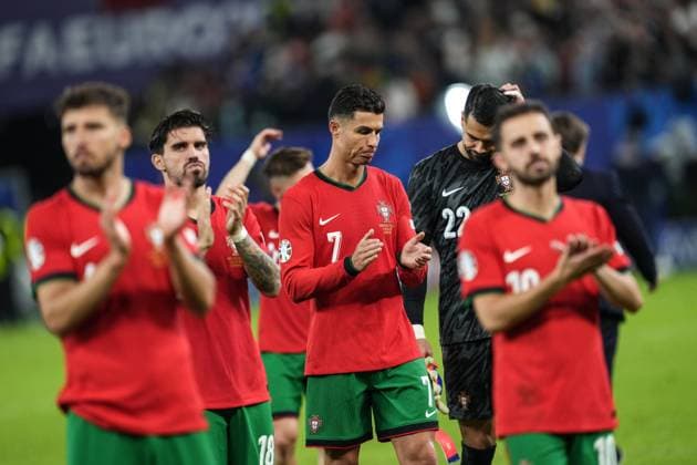 (240706) -- HAMBURG, July 6, 2024 -- Cristiano Ronaldo (C) of Portugal reacts after losing the UEFA EURO, EM, Europameisterschaft,Fussball 2024 quarter-final match between Portugal and France in Hamburg, Germany on July 5, 2024. ) (SP)GERMANY-HAMBURG-FOOTBALL-EURO 2024-QUARTER FINAL-PORTUGAL VS FRANCE PanxYulong 