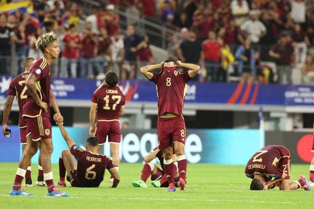 Venezuela™s soccer players react after losing by penalty definition against Canada during the Copa AmÃ rica USA 2024 quarterfinal match at AT&T Stadium in Arlington, TX, on July 5, 2024. Canada won and qualified to face Argentina in semifinals in New Jersey on July 9. ARLINGTON UNITED STATES Copyright: xALEJANDROxPAGNIx