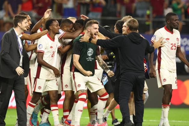 Canada s soccer players celebrate after defeating Venezuela by penalty kick during the Copa AmÃ rica USA 2024 quarterfinal match at AT&T Stadium in Arlington, TX, on July 5, 2024. Canada qualified to face Argentina in semifinals in New Jersey on July 9. ARLINGTON UNITED STATES Copyright: xALEJANDROxPAGNIx