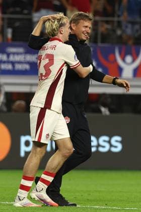 Canada™s American head coach Jesse Alan Marsch (R) and forward Liam Millar celebrate after defeating Venezuela by penalty kick during the Copa AmÃ rica USA 2024 quarterfinal match at AT&T Stadium in Arlington, TX, on July 5, 2024. Canada qualified to face Argentina in semifinals in New Jersey on July 9. ARLINGTON UNITED STATES Copyright: xALEJANDROxPAGNIx