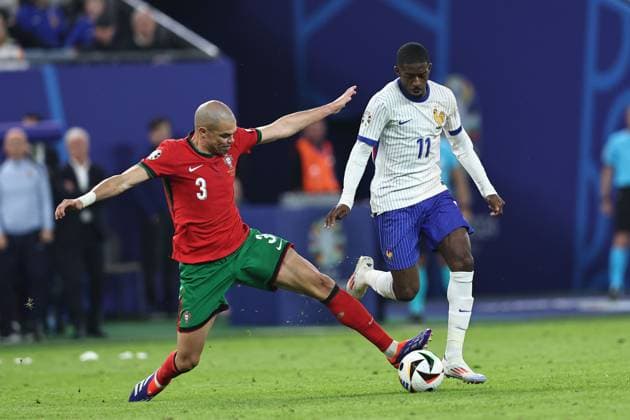 Ousmane Dembele (France) Pepe Kepler Laveran de Lima Ferreira (Portugal) during the UEFA EURO, EM, Europameisterschaft,Fussball Germany 2024 match between Portugal 4-5 France at Volkspakstadion on July 05, 2024 in Hamburg , Germany. Noxthirdxpartyxsales  (258789792)