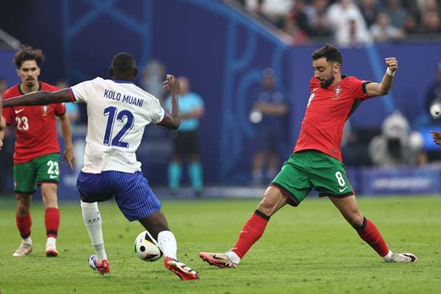 Bruno Fernandes (Portugal)Randal Kolo Muani (France) during the UEFA EURO, EM, Europameisterschaft,Fussball Germany 2024 match between Portugal 4-5 France at Volkspakstadion on July 05, 2024 in Hamburg , Germany. Noxthirdxpartyxsales  (258790153)