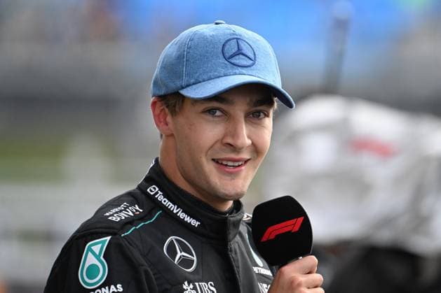 6th July 2024; Silverstone Circuit, Northamptonshire, England; Formula 1 2024 Qatar Airways British F1 Grand Prix; Qualifying Day; George Russell (63) of Mercedes is interviewed after qualifying in first place and taking pole position for the British Grand Prix  ActionPlus12664976 SimonxWest