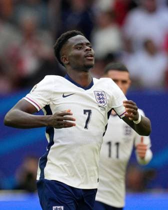 Bukayo Saka of England celebrates their goal to make it 1-1 England v Switzerland, UEFA European Championship, EM, Europameisterschaft 2024, Quarter Final, Football, Dusseldorf Arena, Dusseldorf, Germany, 06 Jul 2024 EDITORIAL USE ONLY No use with unauthorised audio, video, data, fixture lists, club league logos or live services. Online in-match use limited to 120 images, no video emulation. No use in betting, games or single club league player publications. Copyright: xDavexShopland Shutterstockx 14571391ch