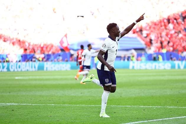 Bukayo Saka of England celebrates their goal to make it 1-1 England v Switzerland, UEFA European Championship, EM, Europameisterschaft 2024, Quarter Final, Football, Dusseldorf Arena, Dusseldorf, Germany, 06 Jul 2024 EDITORIAL USE ONLY No use with unauthorised audio, video, data, fixture lists, club league logos or live services. Online in-match use limited to 120 images, no video emulation. No use in betting, games or single club league player publications. Copyright: xMichaelxZemanek Shutterstockx 14571385br