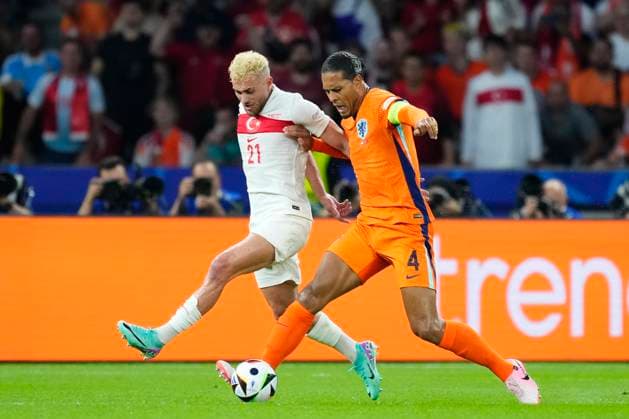 Netherlands v Türkiye: Quarter-Final - UEFA EURO, EM, Europameisterschaft,Fussball 2024 BarÄ±s Alper YÄ±lmaz right winger of Turkey and Galatasaray and Virgil van Dijk Centre-Back of Netherland and Liverpool FC compete for the ball during the UEFA EURO 2024 quarter-final match between Netherlands and Türkiye at Olympiastadion on July 6, 2024 in Berlin, Germany. Berlin Germany  Copyright: xJosexBretonx originalFilename:bretonhernandez-netherla240706_npnCn.jpg