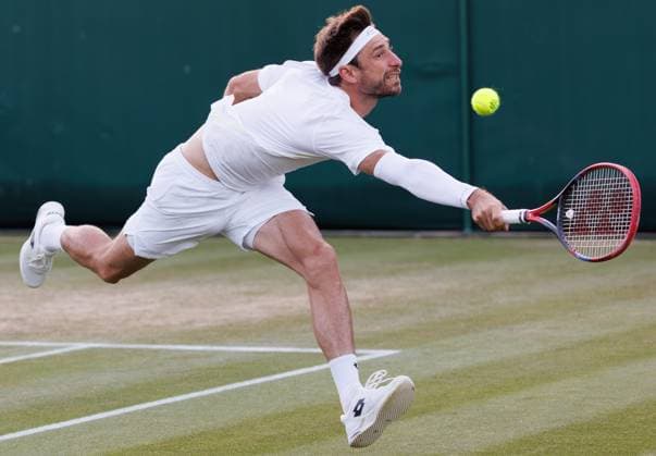 Belgian Sander Gille pictured in action during a doubles tennis match between Belgian pair Gille-Vliegen and British-Dutch pair Glasspool - Rojer, in the second round of the men s doubles competition of the 2024 Wimbledon grand slam tournament at the All England Tennis Club, in south-west London, Britain, Saturday 06 July 2024. BENOITxDOPPAGNE  x95980420x
