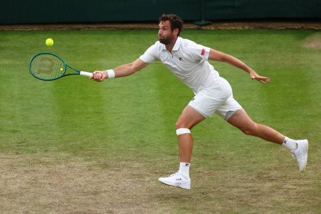 6th July 2024; All England Lawn Tennis and Croquet Club, London, England; Wimbledon Tennis Tournament, Day 6; Quentin Halys (FRA) in action during his third round match against Holger Rune (DEN)  ActionPlus12665274 ShaunxBrooks
