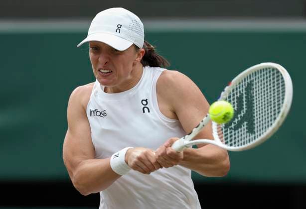 (240707) -- LONDON, July 7, 2024 -- Iga Swiatek hits a return during the women s singles third round match between Yulia Putintseva of Kazakhstan and Iga Swiatek of Poland at Wimbledon tennis Championship in London, Britain on July 6, 2024. ) (SP)BRITAIN-LONDON-TENNIS-WIMBLEDON HanxYan 