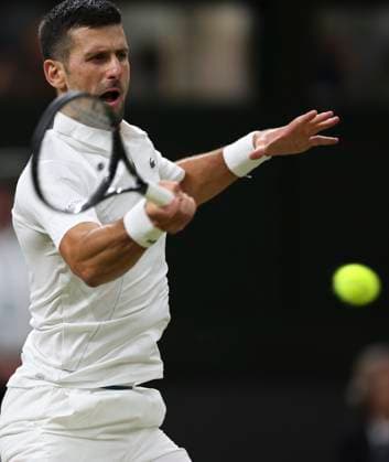 (240707) -- LONDON, July 7, 2024 -- Novak Djokovic hits a return during the men s singles third round match between Novak Djokovic of Serbia and Alexei Popyrin of Australia at Wimbledon tennis Championship in London, Britain on July 6, 2024. ) (SP)BRITAIN-LONDON-TENNIS-WIMBLEDON HanxYan 