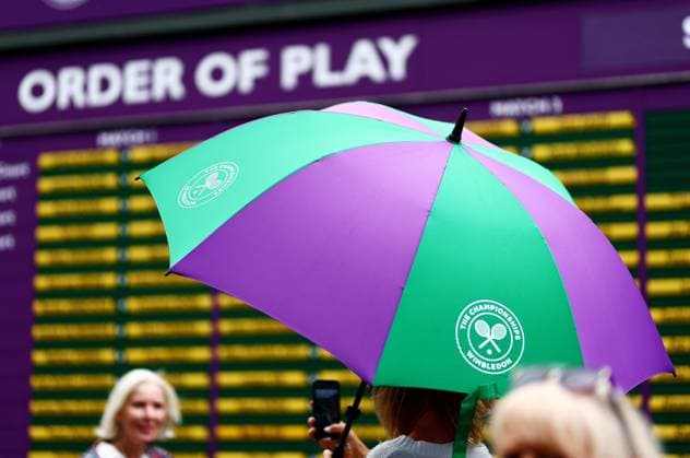 Umbrellas are seen up around centre court as rain falls before the start of play. Wimbledon Tennis Championships, Day 7, The All England Lawn Tennis and Croquet Club, London, UK - 07 Jul 2024  Copyright: xJamesxMarsh Shutterstockx 14575060c