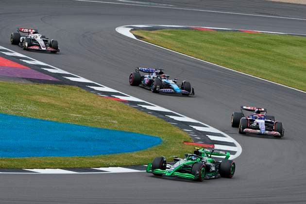 F1 Grand Prix of Great Britain Zhou Guanyu of China driving the (24) Stake F1 Team Kick Sauber C44 Ferrari on track and Daniel Ricciardo of Australia driving the (3) Visa Cash App RB Formula One Team VCARB 01 on track during the F1 Grand Prix of Great Britain at Silverstone Circuit on July 7, 2024, in Northampton, England. Northampton Silverstone Circuit Northampton England RL_GPF1GB24_01093 Copyright: xRicardoxLarreinax