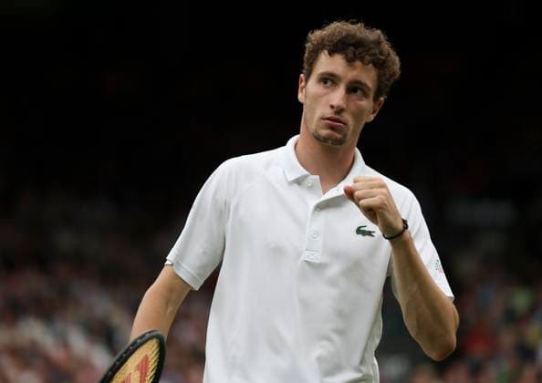 (240708) -- LONDON, July 8, 2024 -- Ugo Humbert celebrates scoring during the men s singles 4th round match between Ugo Humbert of France and Carlos Alcaraz of Spain at Wimbledon tennis Championship in London, Britain, on July 7, 2024. ) (SP)BRITAIN-LONDON-TENNIS-WIMBLEDON-DAY 7 HanxYan 