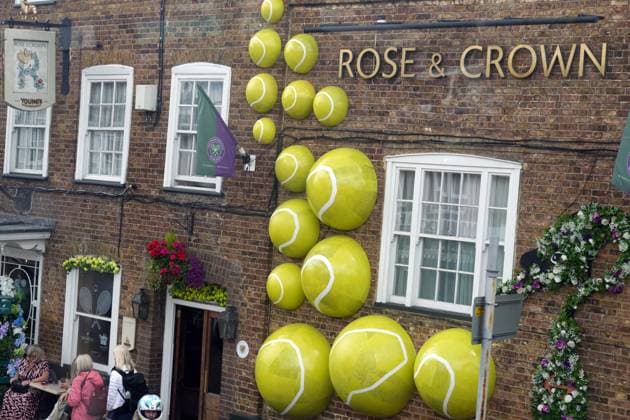Lawn Tennis - 2024 Wimbledon Championship Lorenzo Musetti (ITA) v Giovanni Mpetshi Perricard (FRA) All England Lawn Tennis & Croquet Club - Monday 8th July 2024 The Local Pub in Wimbledon Village, covered in Tennis Balls 