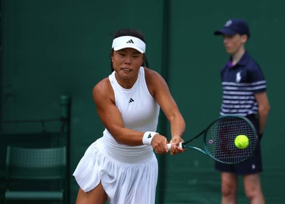8th July 2024; All England Lawn Tennis and Croquet Club, London, England; Wimbledon Tennis Tournament, Day 8; Mingge Xu (GBR) with a backhand shot to Joy De Zeeuw (NED) in their womens singles match  ActionPlus12666223 JohnxPatrickxFletcher