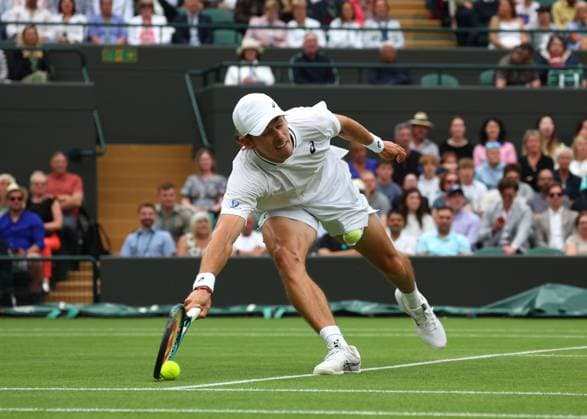 8th July 2024; All England Lawn Tennis and Croquet Club, London, England; Wimbledon Tennis Tournament, Day 8; Alex de Minaur (AUS) with a forehand shot to Arthur Fils (FRA) in their mens singles match of last 16  ActionPlus12666232 JohnxPatrickxFletcher