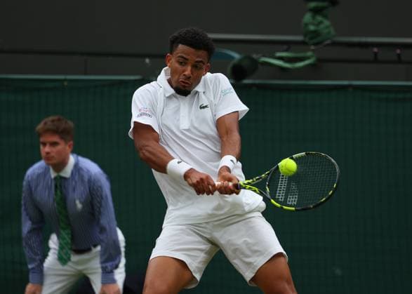 8th July 2024; All England Lawn Tennis and Croquet Club, London, England; Wimbledon Tennis Tournament, Day 8; Arthur Fils (FRA) with a backhand shot to Alex de Minaur (AUS), mens singles match  ActionPlus12666244 JohnxPatrickxFletcher