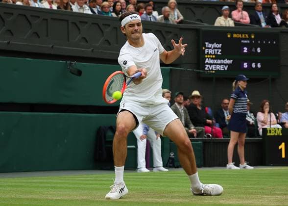 8th July 2024; All England Lawn Tennis and Croquet Club, London, England; Wimbledon Tennis Tournament, Day 8; Taylor Fritz (USA) with a forehand shot to Alexander Zverev (GER), mens singles match  ActionPlus12666274 JohnxPatrickxFletcher