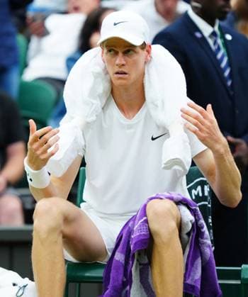 Jannik Sinner with an iced towel around his shoulders during his quarter final match Wimbledon Tennis Championships, Day 9, The All England Lawn Tennis and Croquet Club, London, UK - 09 Jul 2024  Copyright: xJavierxGarcia Shutterstockx 14577169cg