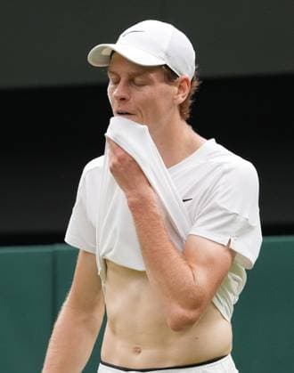 Lawn Tennis - 2024 Wimbledon Championship Jannick Sinner (ITA) v Daniil Medvedev All England Lawn Tennis & Croquet Club - Tuesday 9h July 2024 A dejected Sinner on his way to defeat 