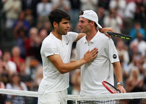 9th July 2024; All England Lawn Tennis and Croquet Club, London, England; Wimbledon Tennis Tournament, Day 9; Defending Champion Carlos Alcaraz (ESP) is congratulated by Tommy Paul (USA) and reaches the mens singles semi finals  ActionPlus12666423 JohnxPatrickxFletcher