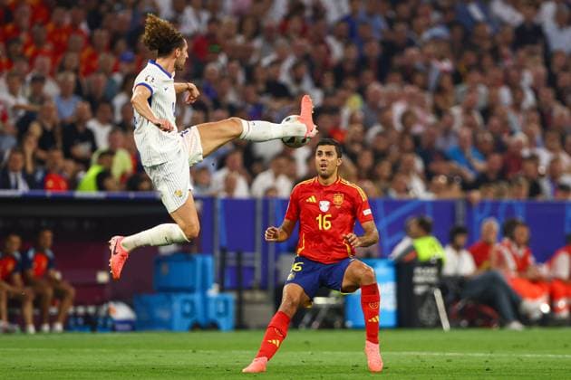 Adrien Rabiot of France under pressure from Rodri of Spain Spain v France, UEFA European Championship, EM, Europameisterschaft 2024, Semi Final, Football, Munich Football Arena, Munich, Germany - 09 Jul 2024 EDITORIAL USE ONLY No use with unauthorised audio, video, data, fixture lists, club league logos or live services. Online in-match use limited to 120 images, no video emulation. No use in betting, games or single club league player publications. Copyright: xKieranxMcManus Shutterstockx 14576874av
