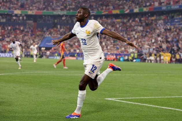 Munich, Germany, 9th July 2024. Randal Kolo Muani of France celebrates after scoring to give the side a 1-0 lead during the UEFA European Championships semi final match at Allianz Arena, Munich. Picture credit should read: Jonathan Moscrop Sportimage EDITORIAL USE ONLY. No use with unauthorised audio, video, data, fixture lists, club league logos or live services. Online in-match use limited to 120 images, no video emulation. No use in betting, games or single club league player publications. SPI-3224-0007