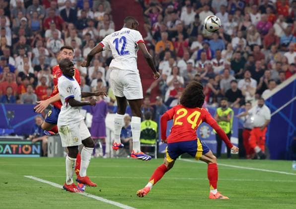 Munich, Germany, 9th July 2024. Randal Kolo Muani of France (3L) scores the opening goal during the UEFA European Championships semi final match at Allianz Arena, Munich. Picture credit should read: Paul Terry Sportimage EDITORIAL USE ONLY. No use with unauthorised audio, video, data, fixture lists, club league logos or live services. Online in-match use limited to 120 images, no video emulation. No use in betting, games or single club league player publications. SPI-3225-0042