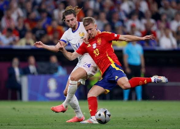 Spain v France: Semi-Final - UEFA EURO, EM, Europameisterschaft,Fussball 2024 Adrien Rabiot of France and Dani Olmo of Spain challenge during the UEFA EURO 2024 semi-final match between Spain v France at Munich Football Arena on July 9, 2024 in Munich, Germany. Munich Munich Football Arena Germany Germany Copyright: xRichardxSellers Sportsphoto APLx 14045075