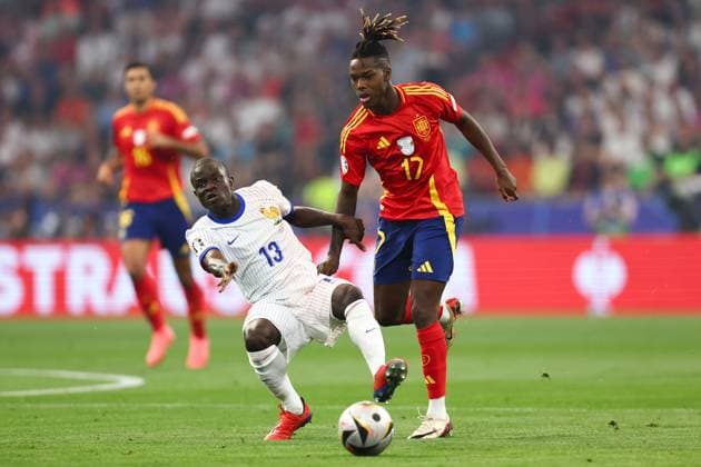Spain v France 9 July 2024, Munich - UEFA EUROs - Semi-Final - Spain v France - Ngolo Kante of France and Nico Williams of Spain - Photo: Charlotte Wilson Offside. Munich Germany Copyright: xCharlottexWilsonx xOffsidexOffside