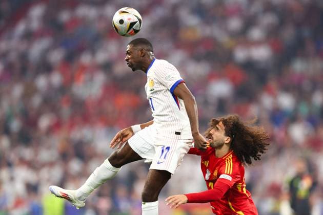 Spain v France 9 July 2024, Munich - UEFA EUROs - Semi-Final - Spain v France - Ousmane Dembele of France and Marc Cucurella of Spain - Photo: Charlotte Wilson Offside. Munich Germany Copyright: xCharlottexWilsonx xOffsidexOffside