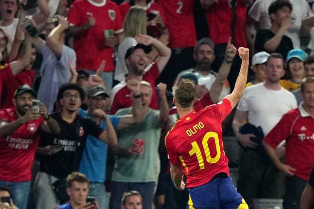 Spain s Dani Olmo celebrates after scoring 2-1 during the Euro 2024 soccer match between Spain and France at the Munich Football Arena , Munich, Germany - Tuesday 09 july 2024. - Soccer .  Copyright: xSpada LaPressex