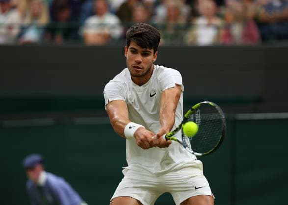 9th July 2024; All England Lawn Tennis and Croquet Club, London, England; Wimbledon Tennis Tournament, Day 9; Defending Champion Carlos Alcaraz (ESP) from the baseline against Tommy Paul (USA), mens singles quarter final match  ActionPlus12666462 JohnxPatrickxFletcher