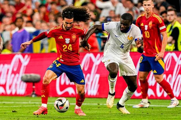 2024-07-09 Spain v France - UEFA EURO, EM, Europameisterschaft,Fussball 2024 Semi Final MUNICH, NETHERLANDS - JULY 9: Marc Cucurella of Spain battles for possession with Aurelien Tchouameni of France during the UEFA EURO 2024 Semi Final match between Spain and France at Munich Football Arena on July 9, 2024 in Munich, Netherlands. Munich Munich Football Arena Netherlands Content not available for redistribution in The Netherlands directly or indirectly through any third parties. Copyright: xAndrexWeeningx