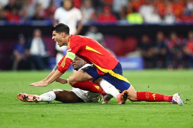 Spain v France 9 July 2024, Munich - UEFA EUROs - Semi-Final - Spain v France - Aurelien Tchouameni of France tackles Alvaro Morata of Spain - Photo: Charlotte Wilson Offside. Munich Germany Copyright: xCharlottexWilsonx xOffsidexOffside
