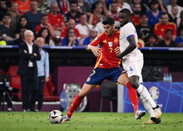 Russia Soccer Euro 2024 Spain - France 8726100 09.07.2024 Spain s Alvaro Morata and France s Dayot Upamecano struggle for the ball during the UEFA EURO, EM, Europameisterschaft,Fussball 2024 semi-final soccer match between Spain and France at the Munich Football Arena in Munich, Germany. Alexey Filippov Sputnik Munich Germany  Copyright: xAlexeyxFilippovx