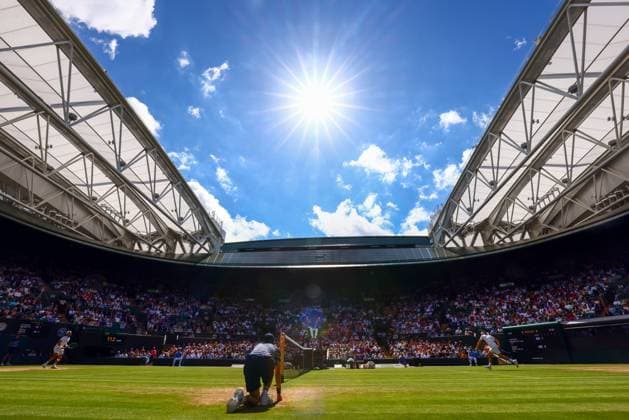 The sun shines above No.1 Court during the quarter final between Taylor Fritz and Lorenzo Musetti Wimbledon Tennis Championships, Day 10, The All England Lawn Tennis and Croquet Club, London, UK - 10 Jul 2024  Copyright: xJamesxMarsh Shutterstockx 14578619db