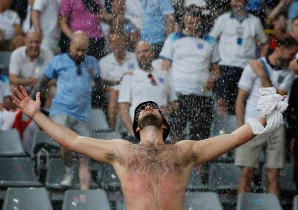Netherlands v England: Semi-Final - UEFA EURO, EM, Europameisterschaft,Fussball 2024 England Fan takes a shower from the rain in the stand before the UEFA EURO 2024 semi-final match between Netherlands and England at Football Stadium Dortmund on July 10, 2024 in Dortmund, Germany. Dortmund Football Stadium Dortmund Germany Germany Copyright: xRichardxSellers Sportsphoto APLx 14045320