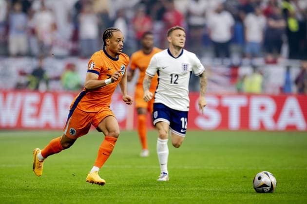 DORTMUND - Xavi Simons of Holland and Kieran Trippier of England (l-r) during the UEFA EURO, EM, Europameisterschaft,Fussball 2024 Semi-final match between the Netherlands and England at the BVB Stadium Dortmund on July 10, 2024 in Dortmund, Germany. ANP KOEN VAN WEEL UEFA EURO 2024 2024 xVIxANPxSportx xxANPxIVx 503202942 originalFilename: 503202942.jpg