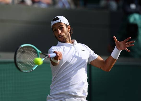 10th July 2024; All England Lawn Tennis and Croquet Club, London, England; Wimbledon Tennis Tournament, Day 10; Lorenzo Musetti (ITA) from the baseline against Taylor Fritz (USA), mens singles quarter final match  ActionPlus12666656 JohnxPatrickxFletcher